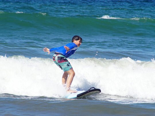 rash guard and water safety briefing before surf lessons in sayulita