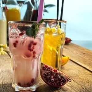 Sayulita Beach Scene showcasing surfers and coconut vendors along the coastline.